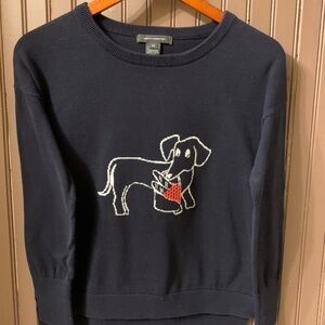 Black Sweater with Dog holding baguettes